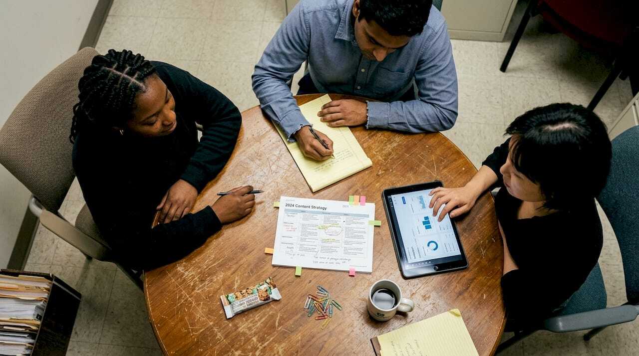 Team discussing small business content strategy