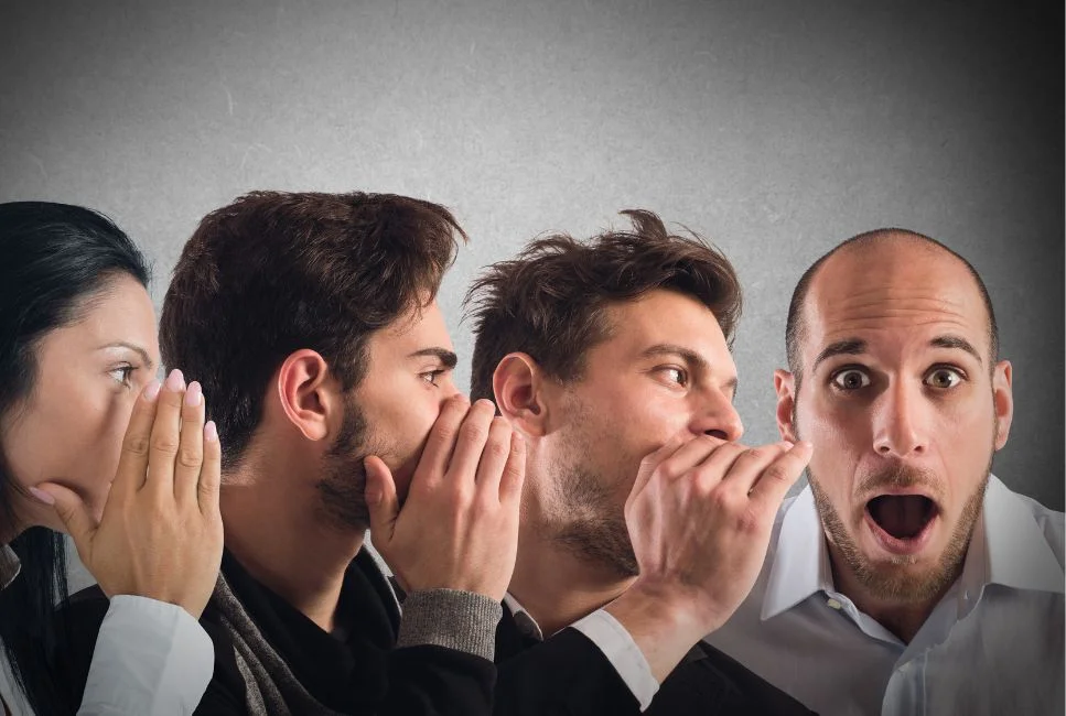 person whispering to each other